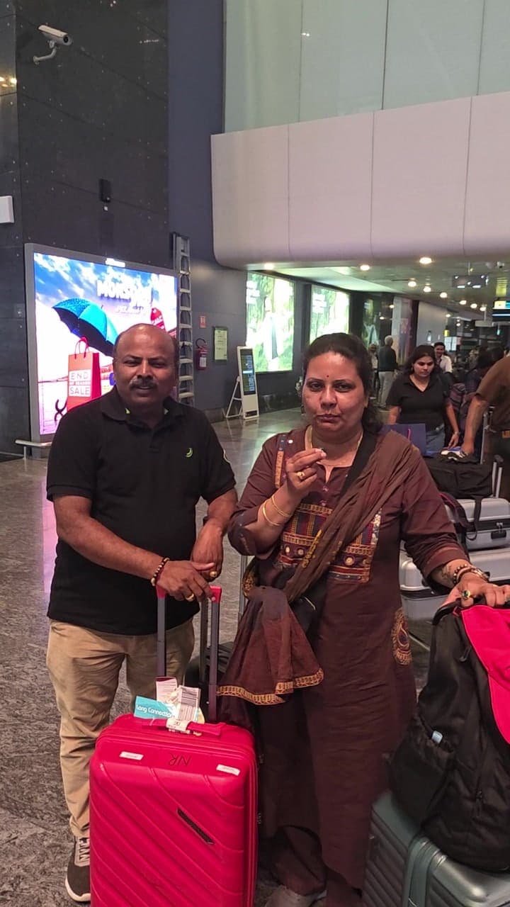 Travellers with their luggage at the airport
