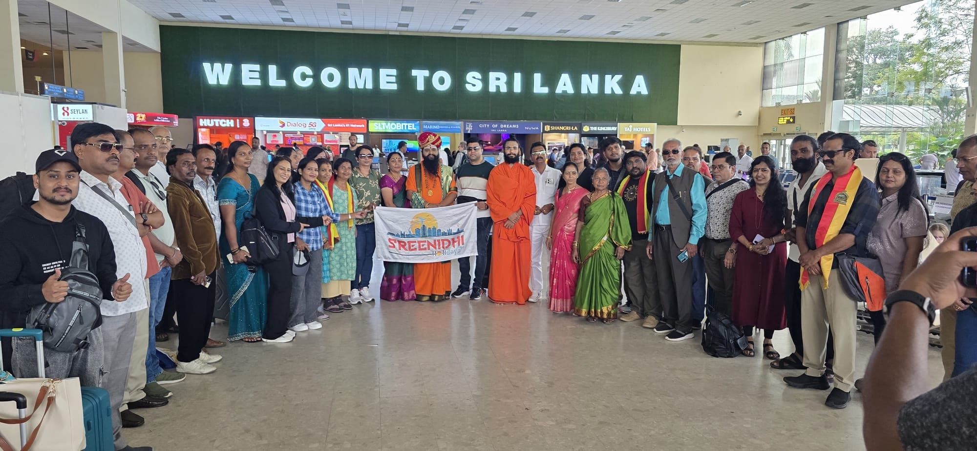 Sreenidhi Holidays group under the Welcome to Sri Lanka sign