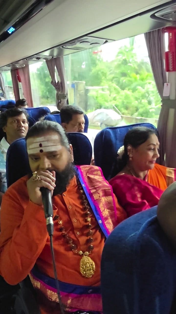 Devotional singing on the tour bus