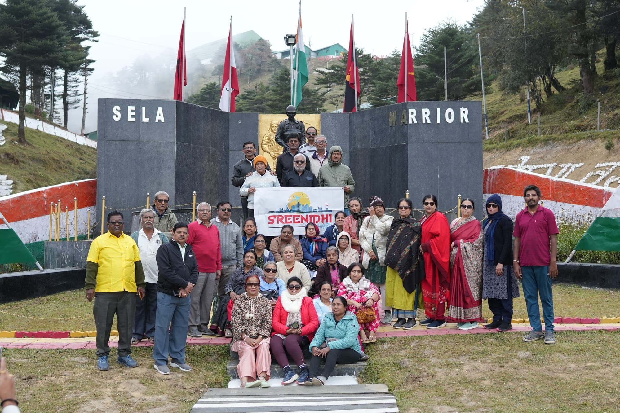 Sreenidhi Holidays group at the Sela Pass war memorial, Arunachal Pradesh