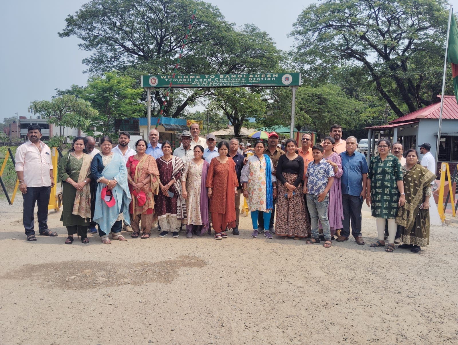 Sreenidhi Holidays group at a park entrance