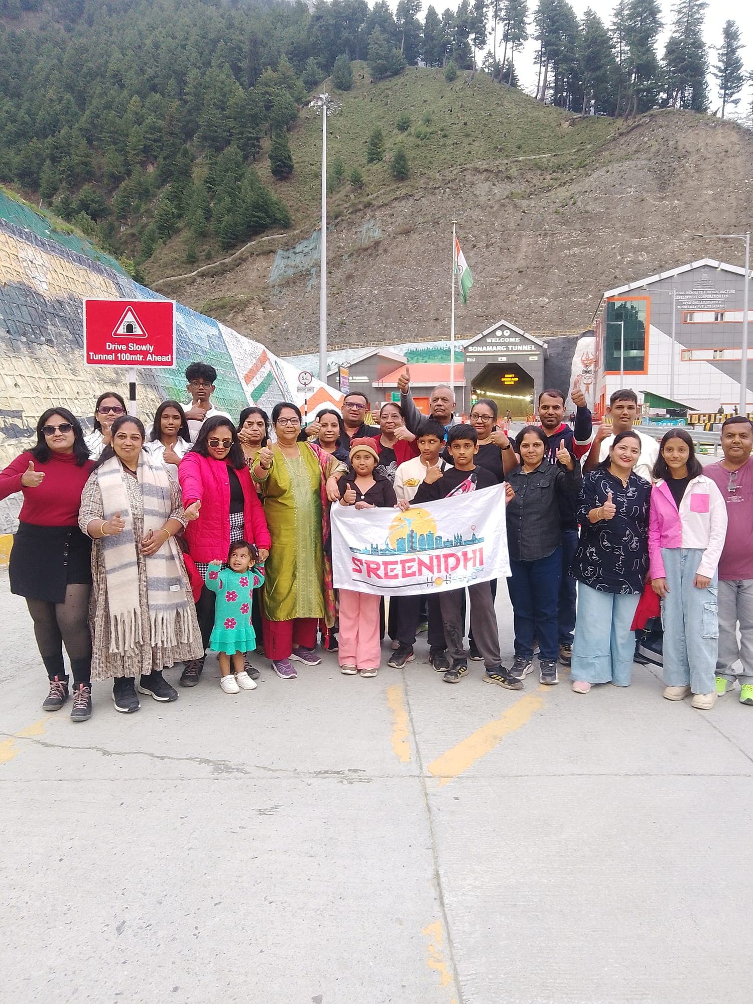 Sreenidhi Holidays group on a mountain road in the Himalayas