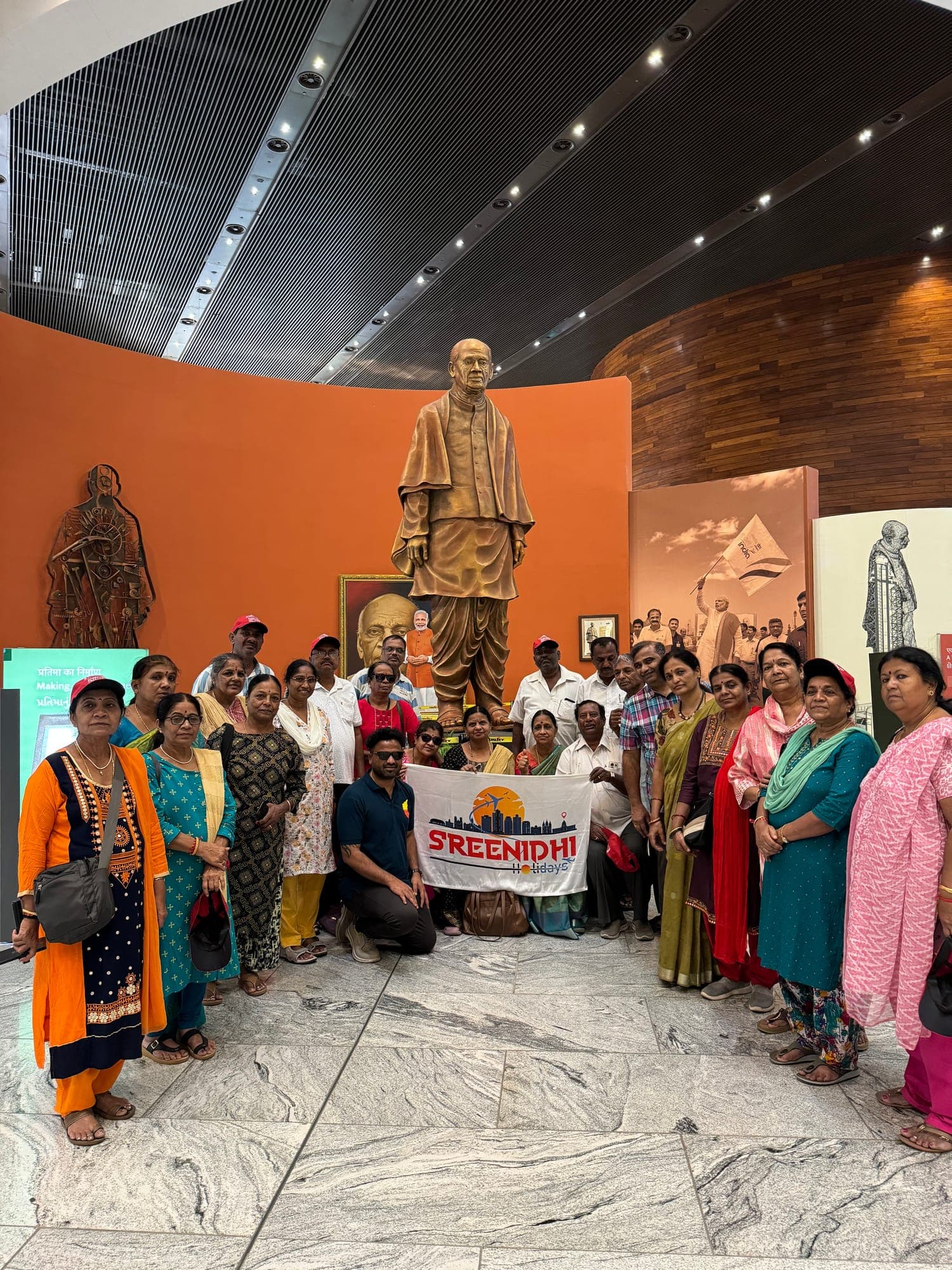 Sreenidhi Holidays group inside a museum gallery