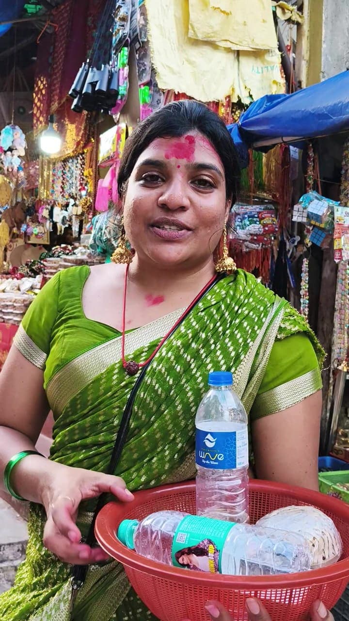 Pilgrim at a temple market stall