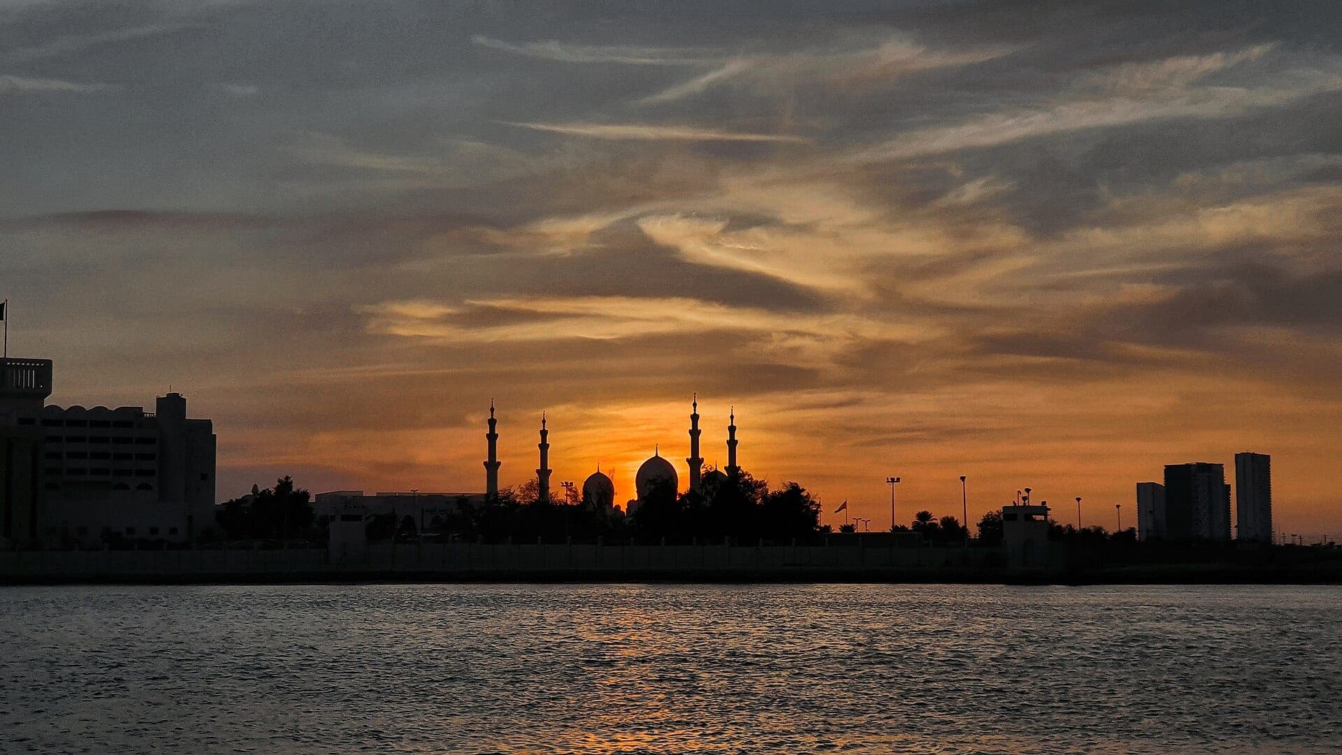 Sheikh Zayed Grand Mosque silhouetted at sunset, Abu Dhabi